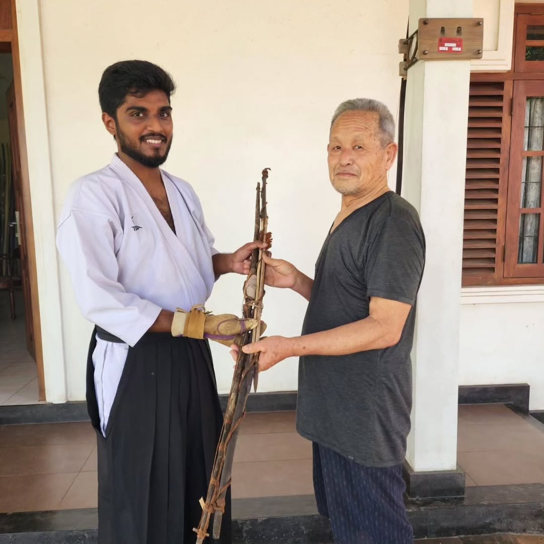 Cultural Exchange & Diplomacy — Gifting indigenous Veddah bows — heritage as living dialogue.